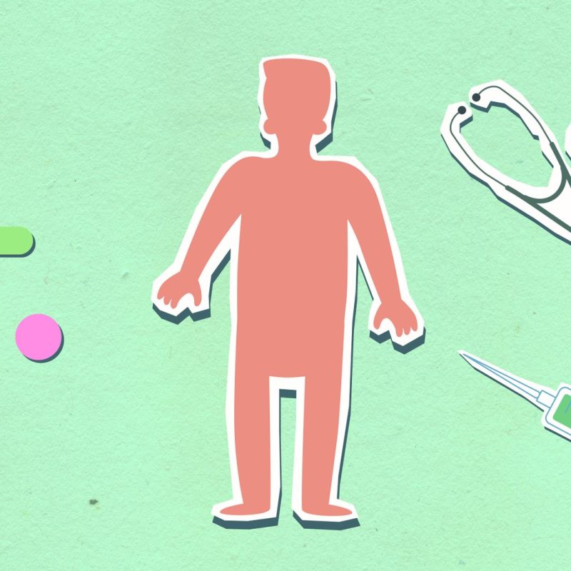 From above of decorative cardboard appliques of person between syringe with stethoscope and medications on green background —