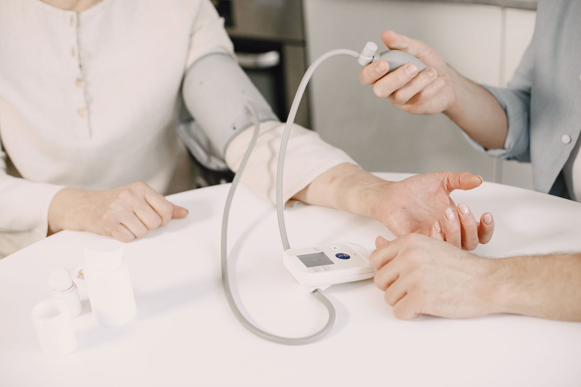 Close-up of blood pressure measurement at home highlighting healthcare equipment. — A number of Nicely being Rewards of Medit