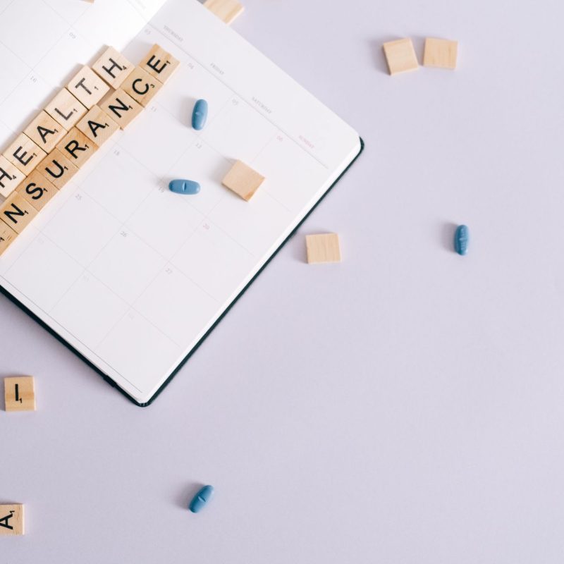 Flat lay of health insurance concept with planner and pills. — An Inter-Disciplinary Answer to Reiki: Tai Chi, Daoism and Med
