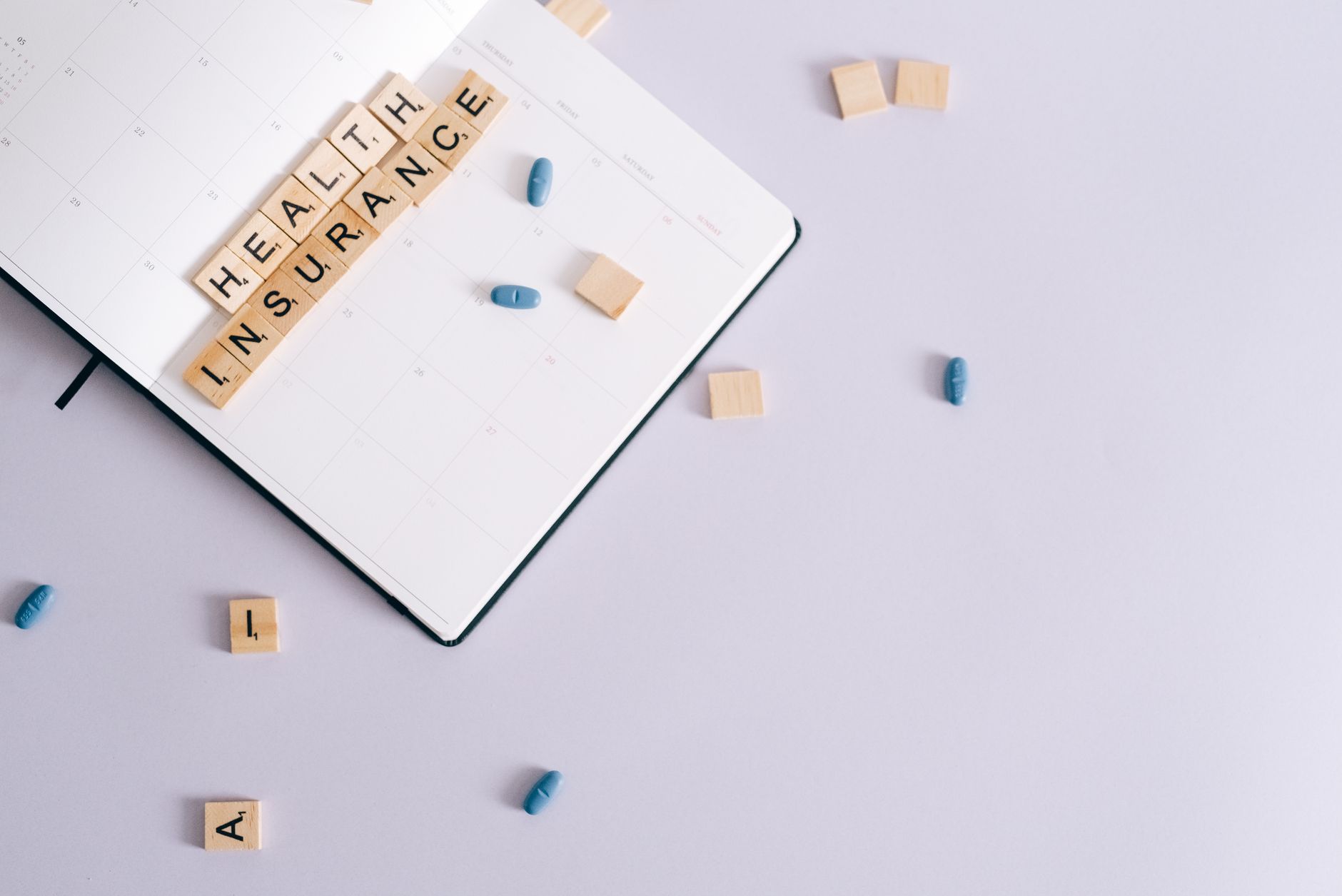 Flat lay of health insurance concept with planner and pills. — An Inter-Disciplinary Answer to Reiki: Tai Chi, Daoism and Med