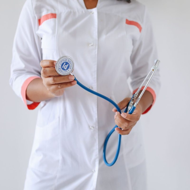 Close-up of a female doctor holding a blue stethoscope, emphasizing healthcare and professionalism. — Buying the Correct Medi